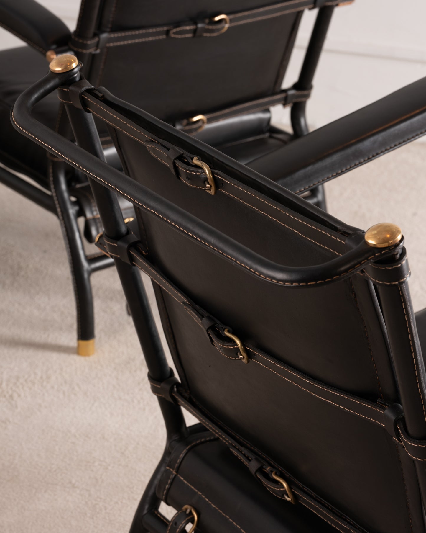 Jacques Adnet - Paire de fauteuils bas - VENDU