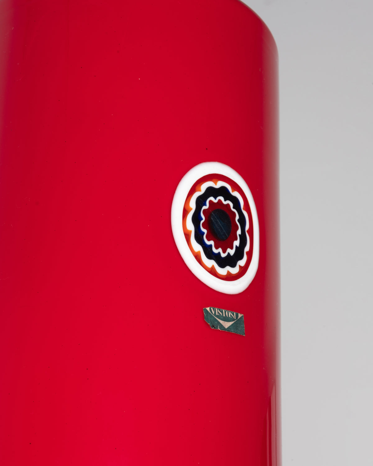Detail of the murrina and the Vistosi label, red Lattimo pendant light by Pianon