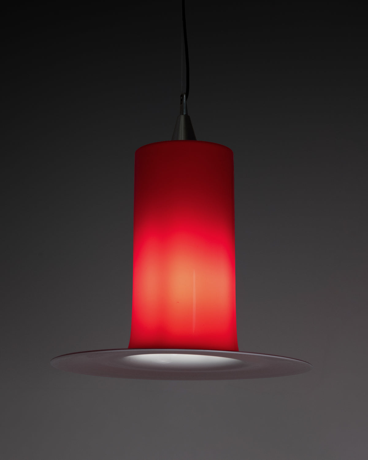 Red Lattimo pendant light by Vistosi, lit
