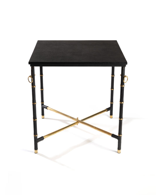 Table à jeux de Jacques Adnet, plateau en skaï noir et piètement style bambou en laiton doré